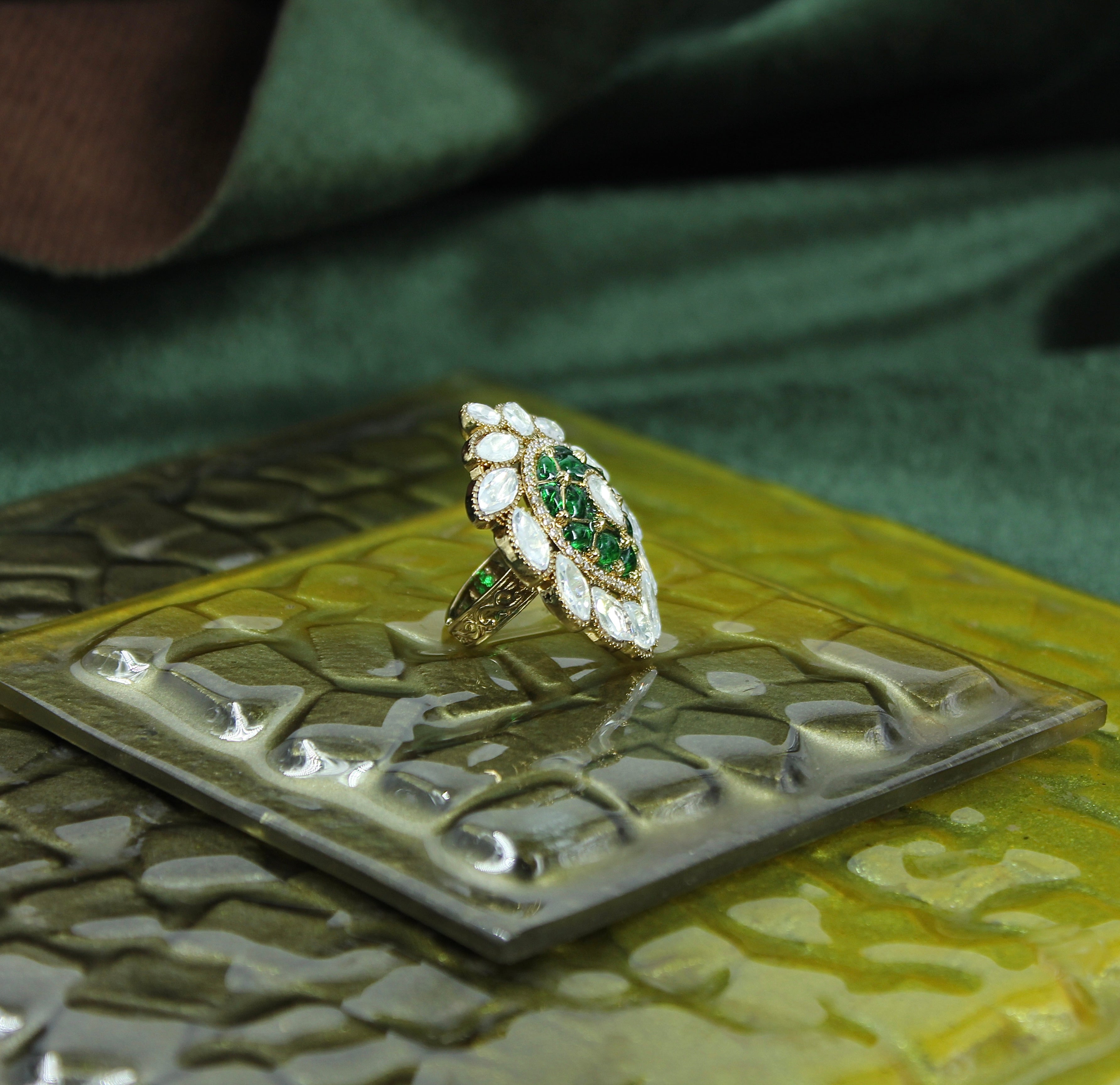 Vishvaja – Emerald Lotus Kundan Ring